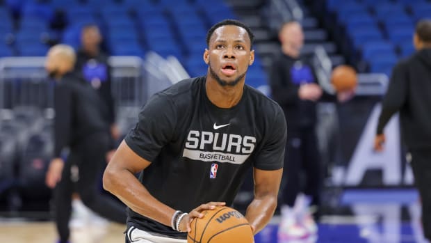 Dec 23, 2022; Orlando, Florida, USA; San Antonio Spurs center Charles Bassey (28) warms up before the game against the Orlando Magic at Amway Center.